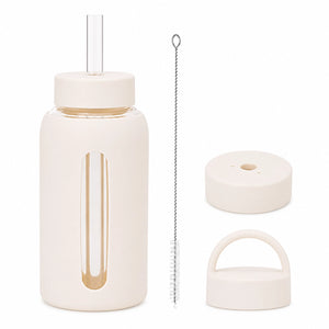 gourde en verre avec paille et protection silicone blanche